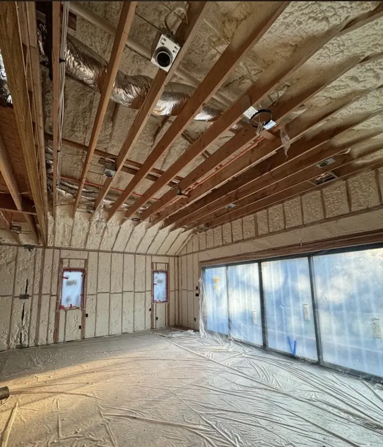 Interior walls and ceiling insulated with spray foam during new construction in Roselle